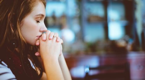 Woman Praying by Ben White